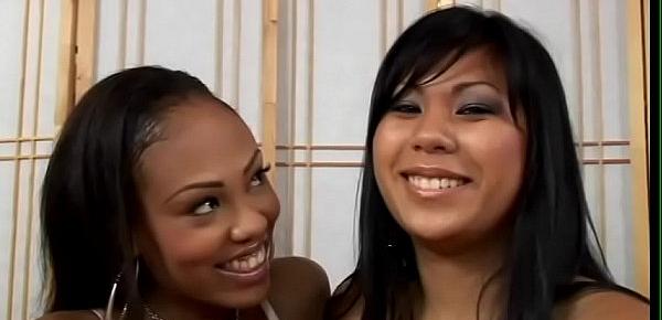  Interracial lesbian action with two babes using massive dildos in rough play